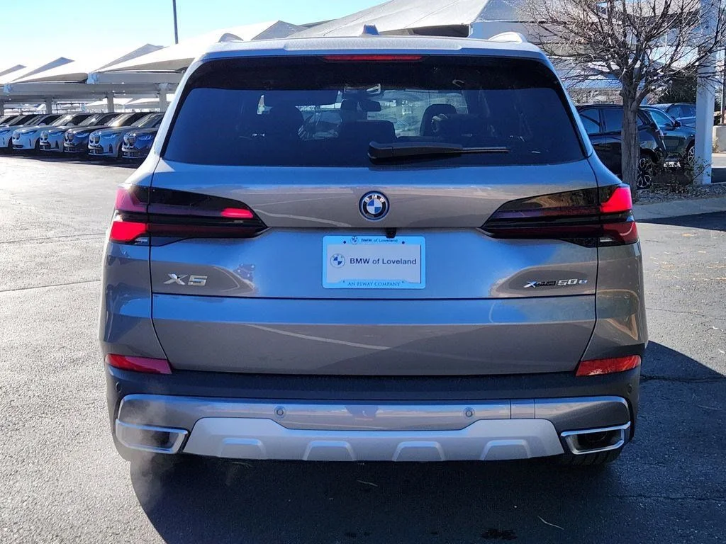 Used 2026 Skyscraper Grey Metallic BMW xDrive50e image 4