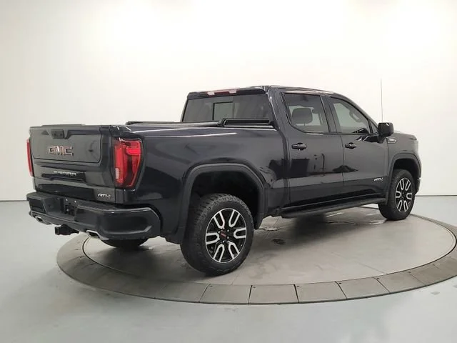 Used 2023 Titanium Rush Metallic GMC AT4 image 7