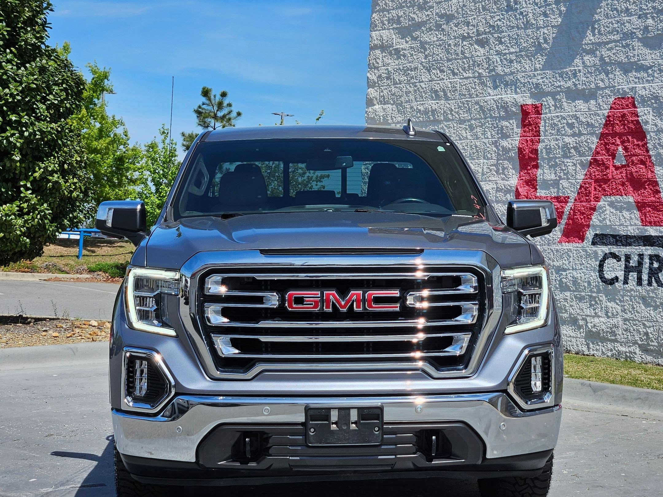 Used 2021 GMC Sierra 1500 SLT with VIN 3GTU9DED1MG313506 for sale in Little Rock