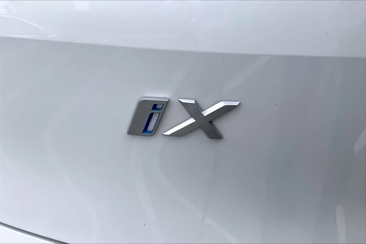Certified Used 2024 Mineral White Metallic BMW xDrive50 image 9