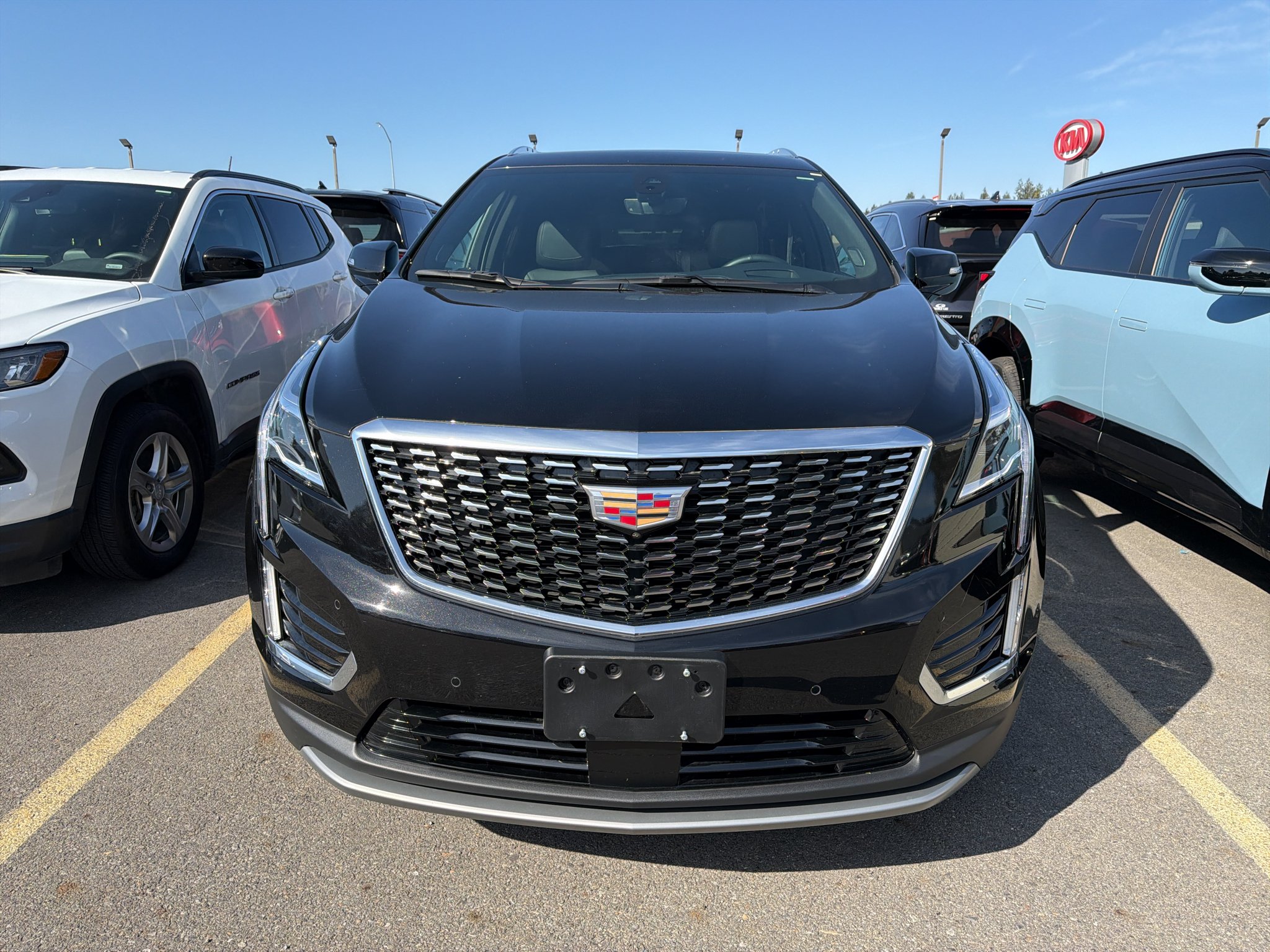 Used 2025 Stellar Black Metallic Cadillac Premium Luxury image 2