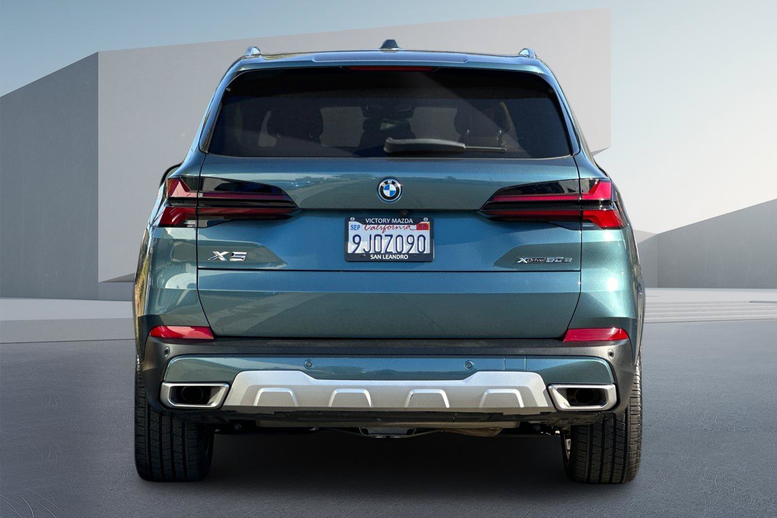 Used 2024 Blue BMW xDrive50e image 6
