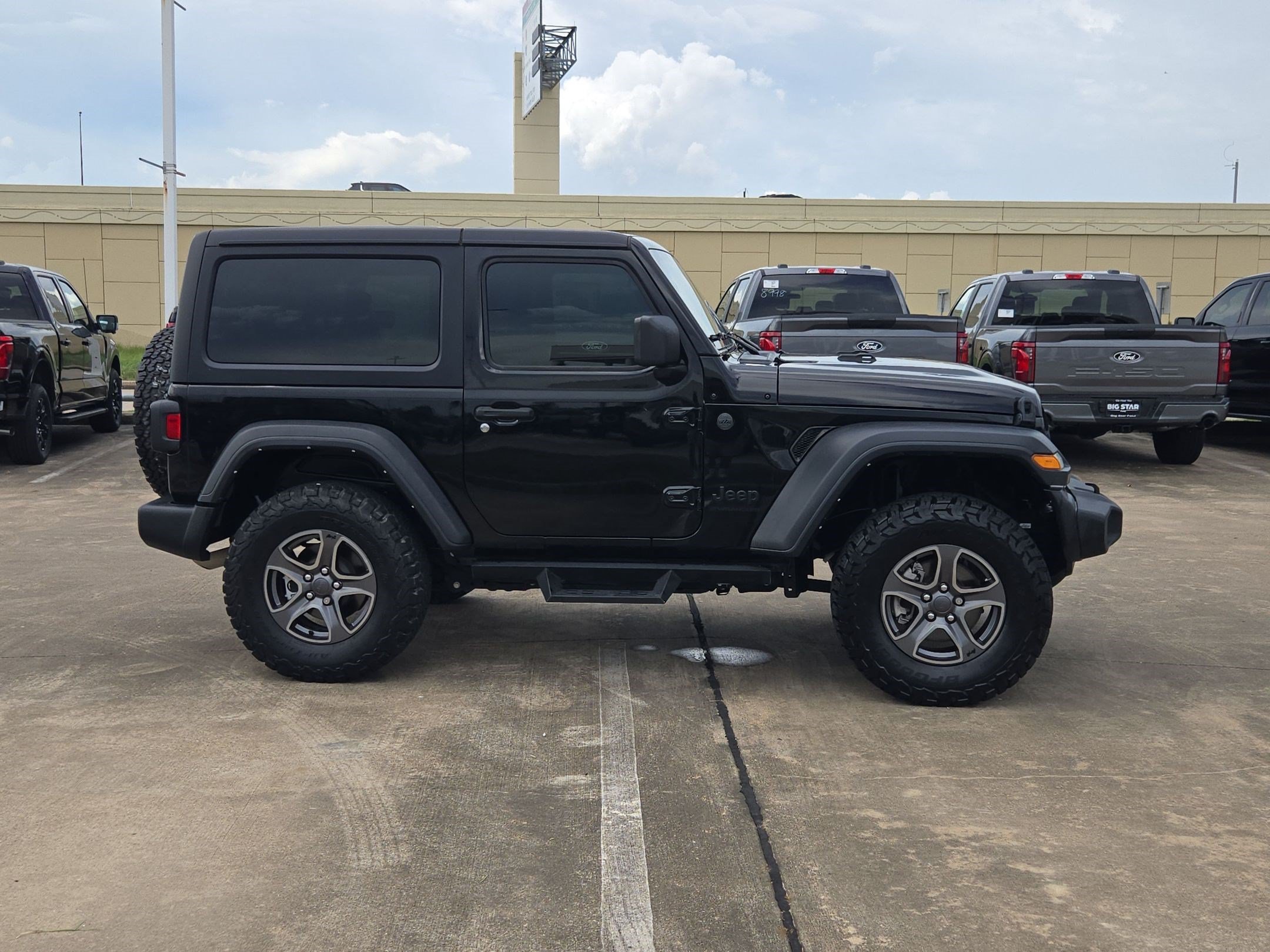 Used 2024 Black Clearcoat Jeep Sport image 2