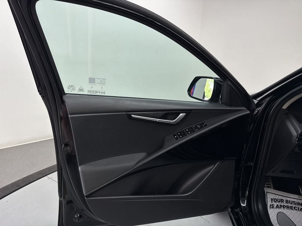 Used 2023 Aurora Black Kia EX Touring image 12