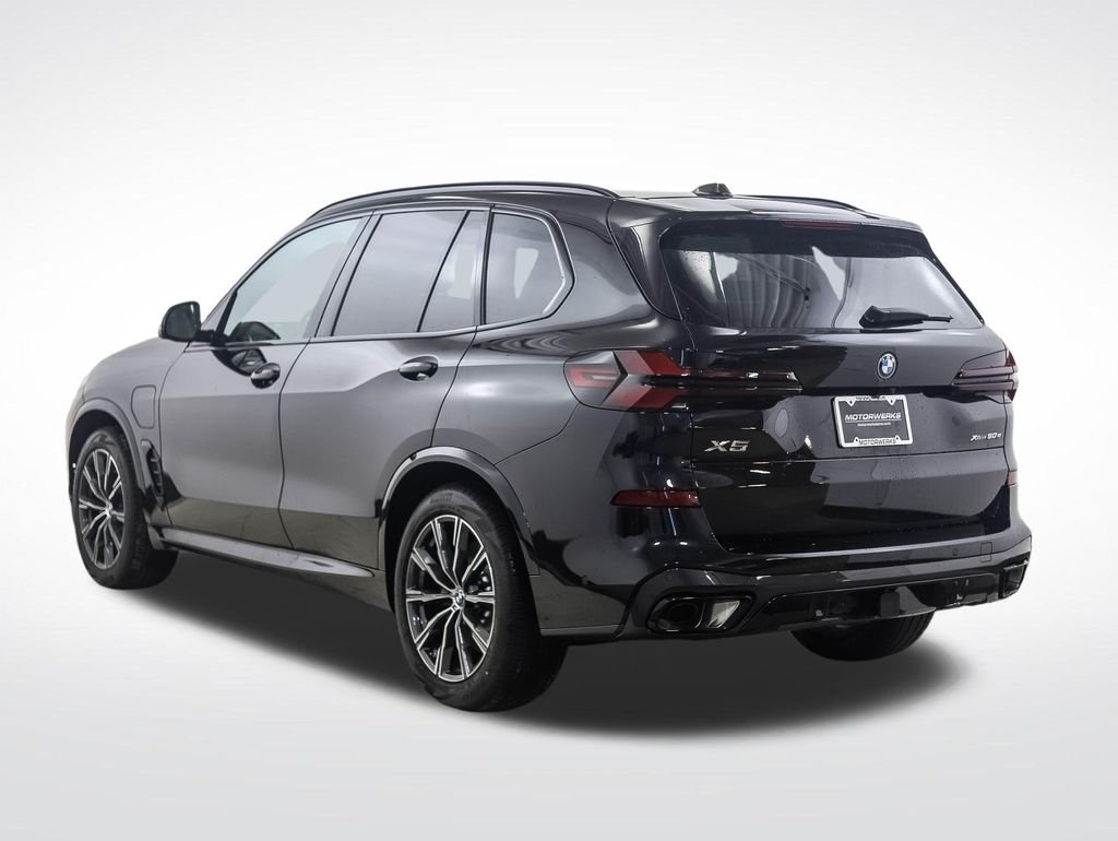 New 2026 Black Sapphire Metallic BMW xDrive50e image 3