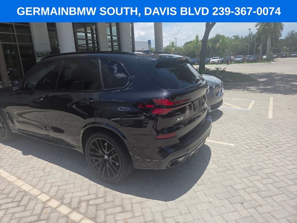 Certified Used 2026 Black Sapphire Metallic BMW sDrive40i image 11