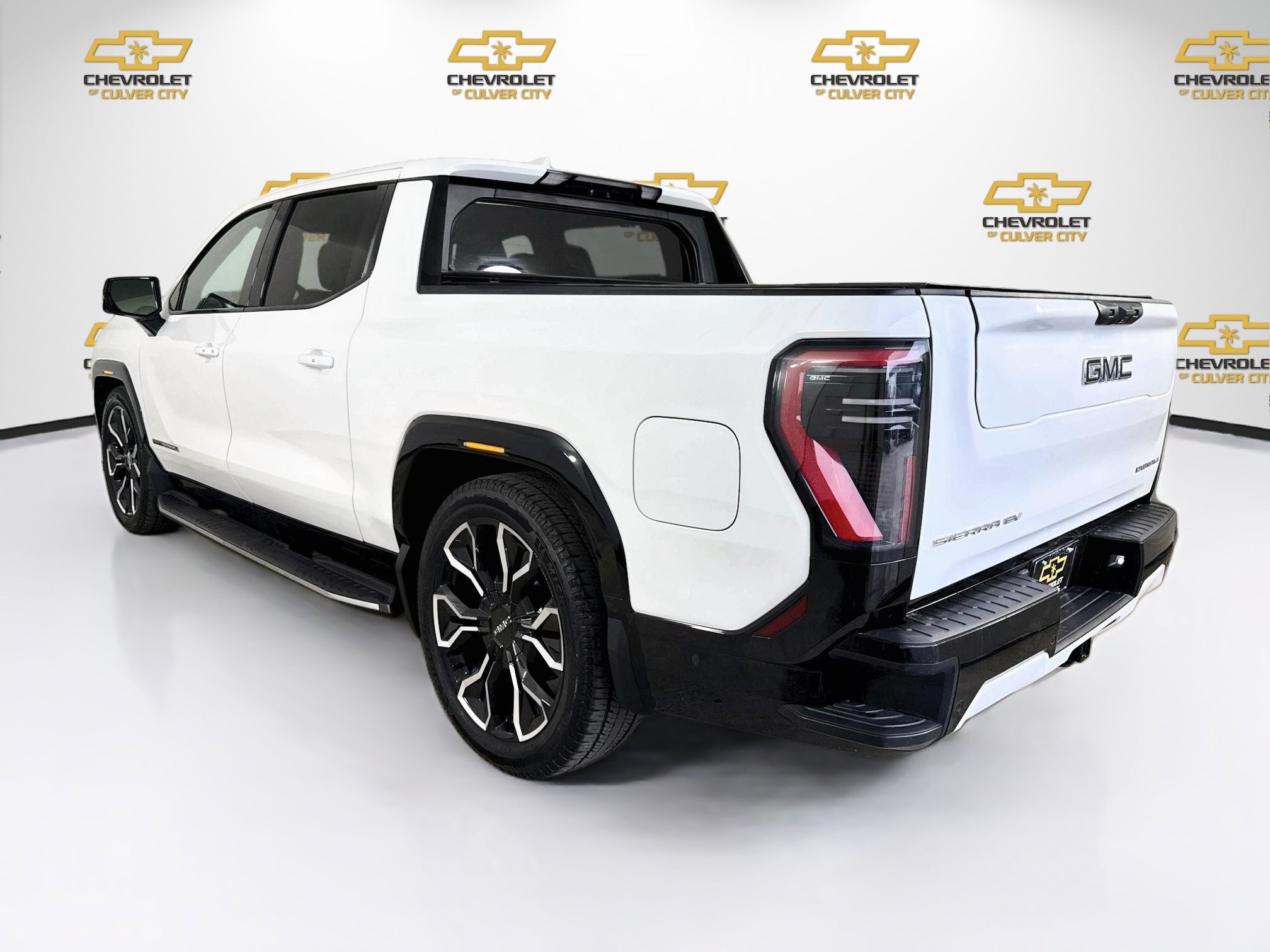 Used 2025 Summit White GMC Max Range Denali image 6