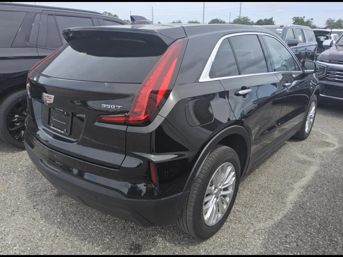 Used 2024 Stellar Black Metallic Cadillac Luxury image 3