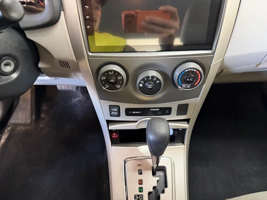 Used 2012 Barcelona Red Metallic Toyota LE image 23