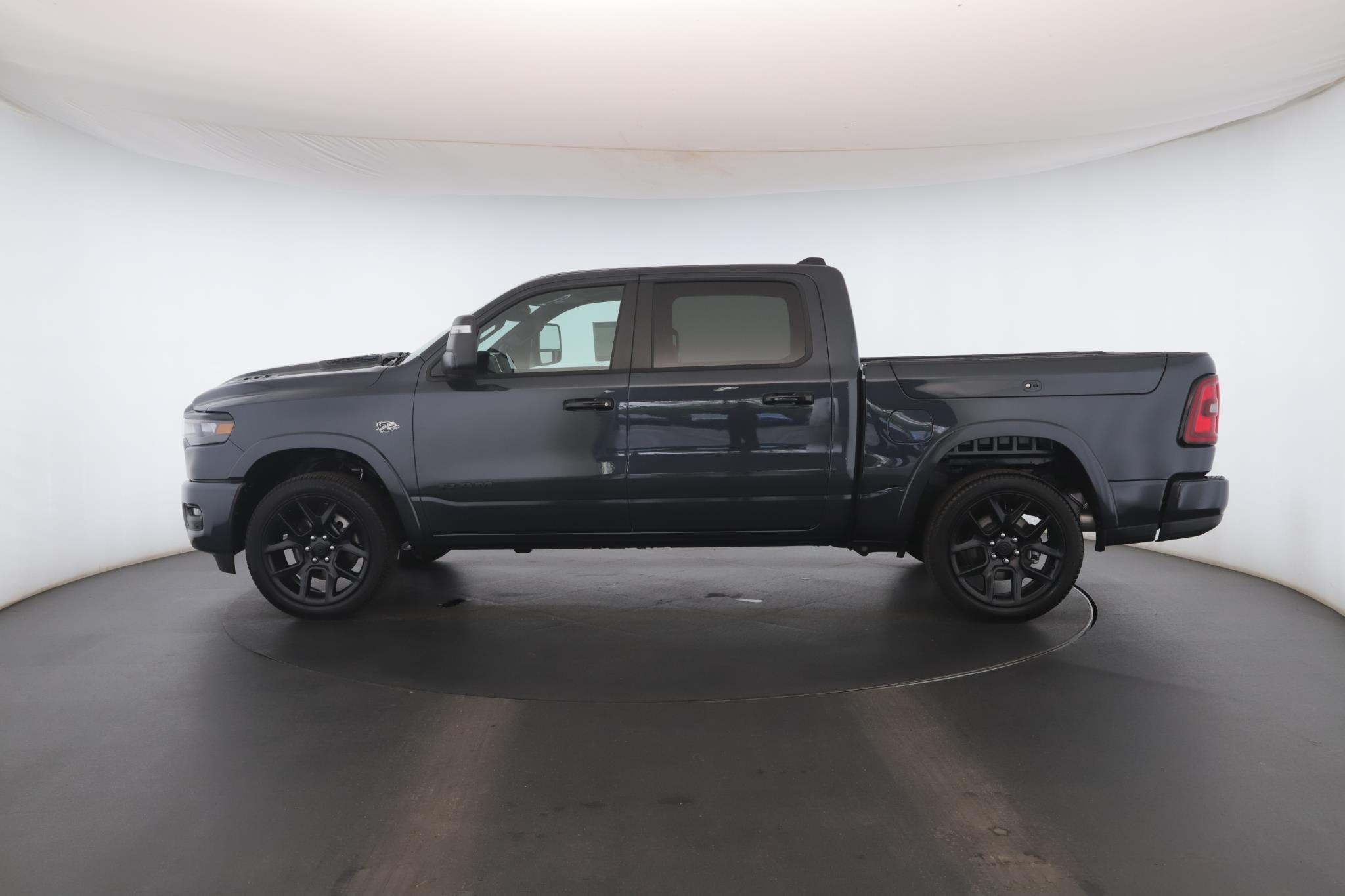 Used 2026 Forged Blue Metallic Ram Laramie 4x4 Crew Cab 5