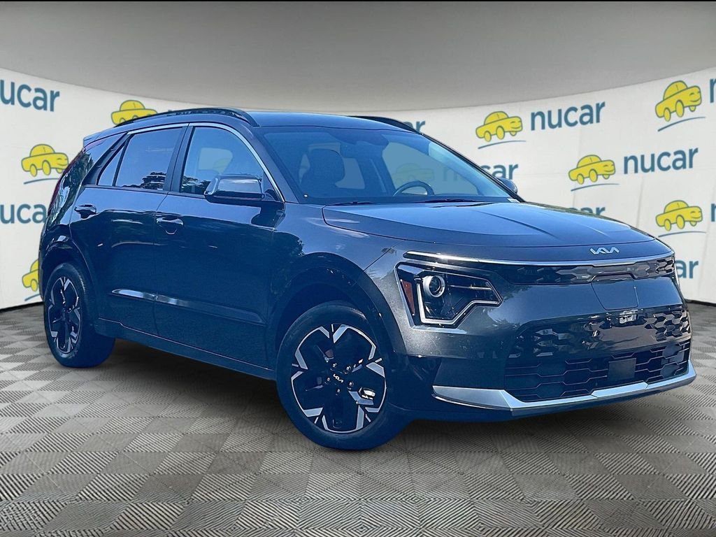 Used 2023 Gray Kia Wind image 1