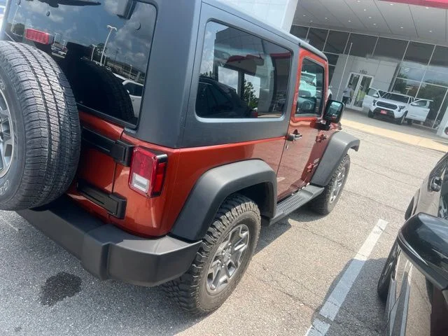 Used 2014 Orange Jeep Sport image 6