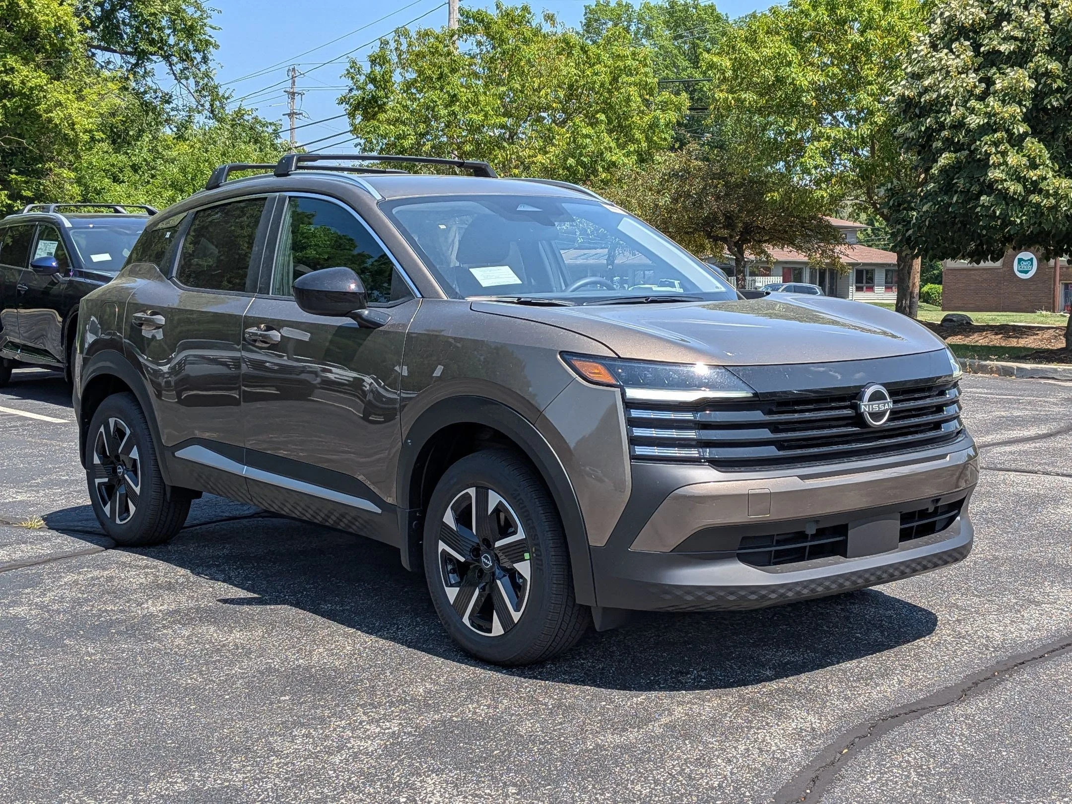 New 2026 Bronze Metallic Nissan SV image 6