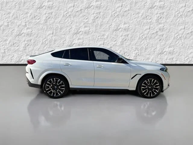 Used 2025 Mineral White Metallic BMW M60i image 2