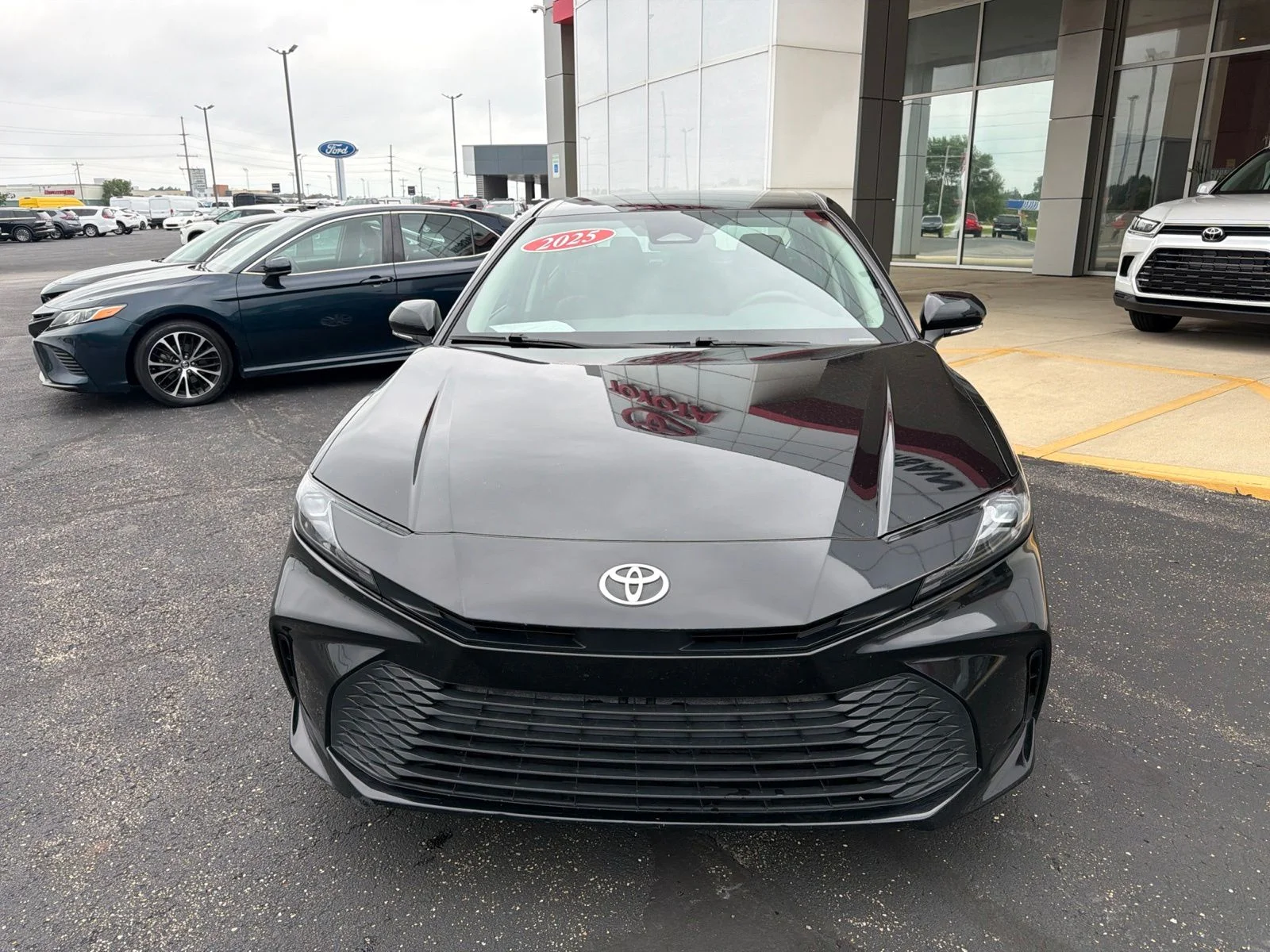 Used 2025 Black Toyota LE image 2