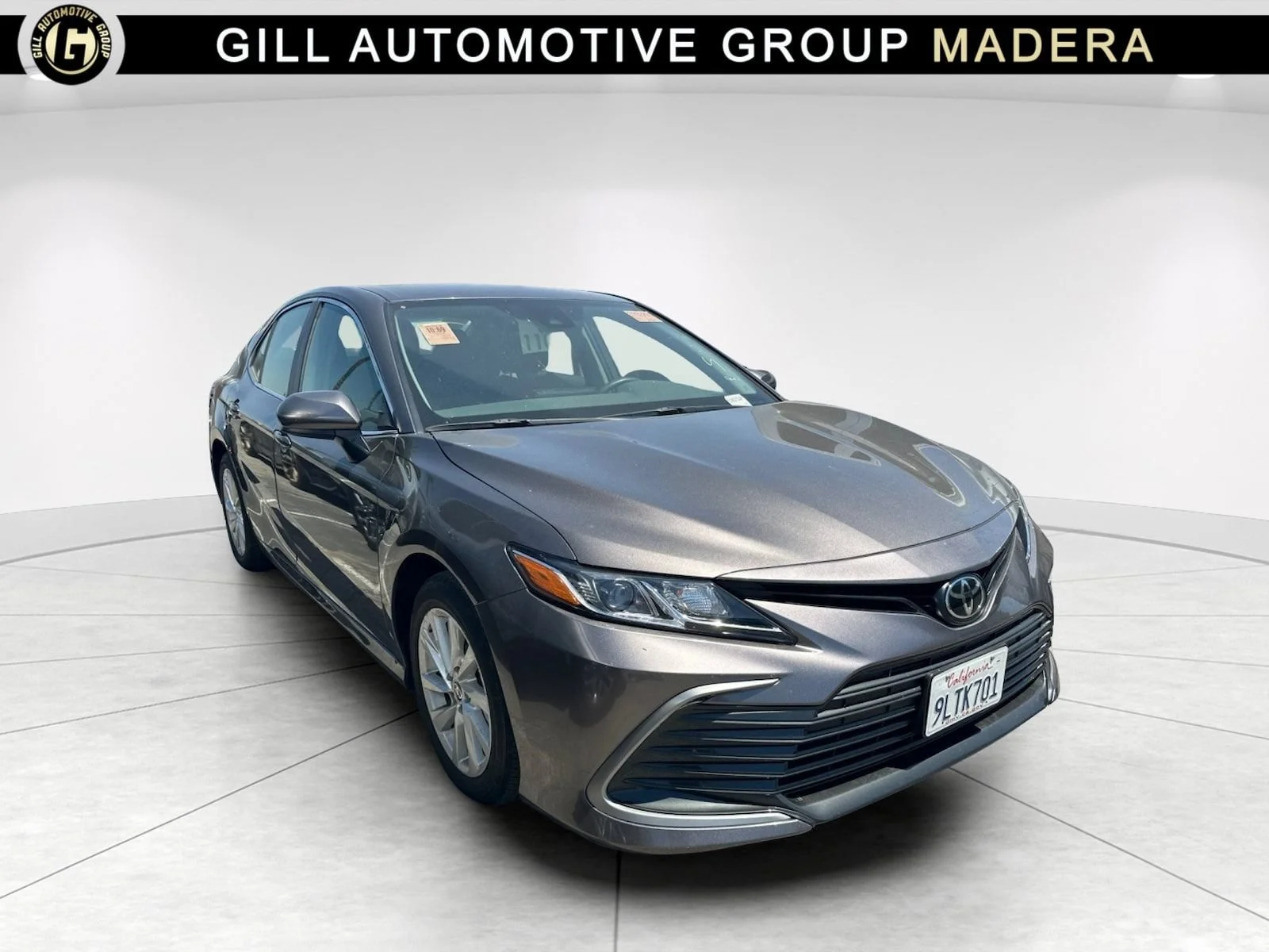 Used 2024 Gray Toyota LE image 1