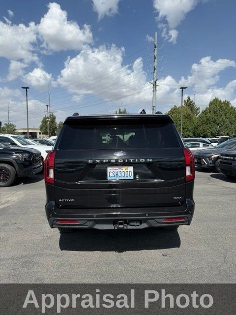 Used 2025 Black Metallic Ford Active image 3