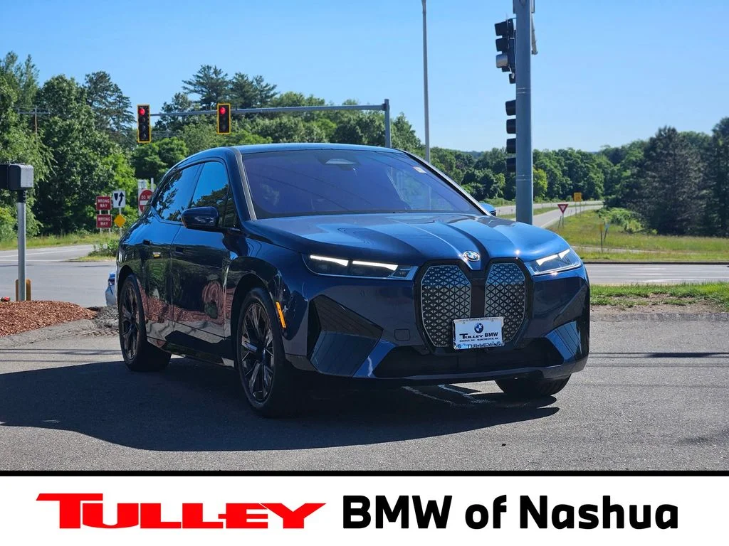 Certified Used 2025 Blue BMW xDrive50 image 1