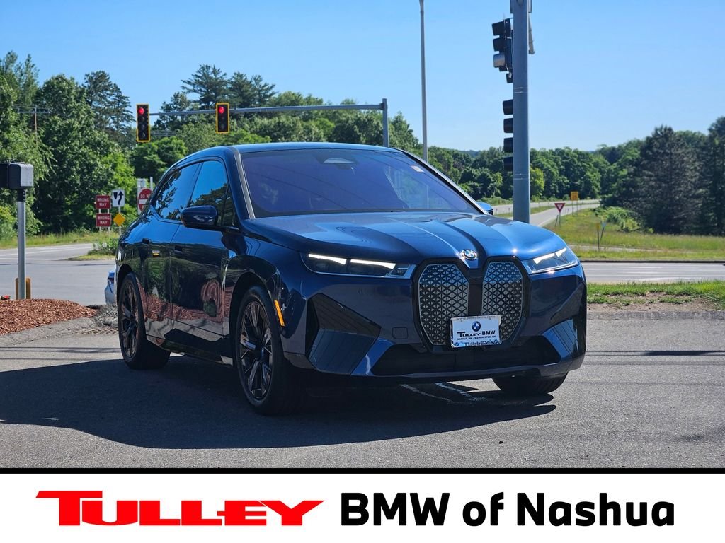 Certified Used 2025 Blue BMW xDrive50 image 1