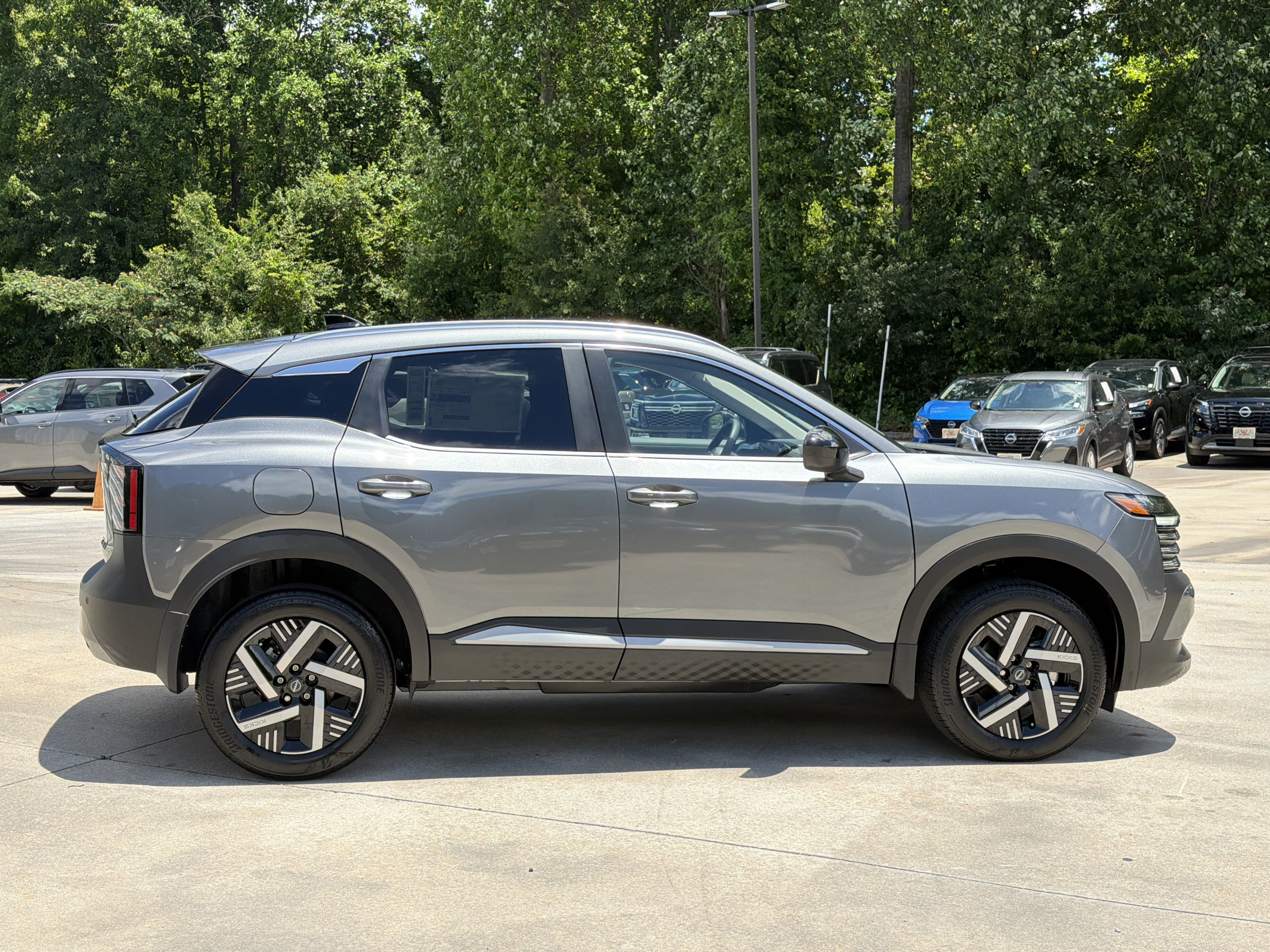 New 2026 Gun Metallic Nissan SV image 9
