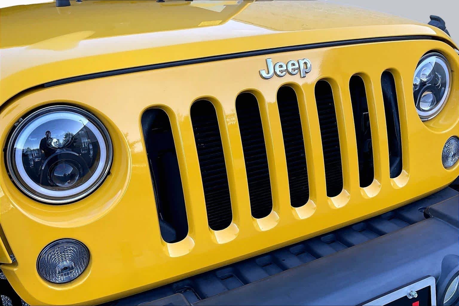 Used 2015 Baja Yellow Clearcoat Jeep Sport image 30