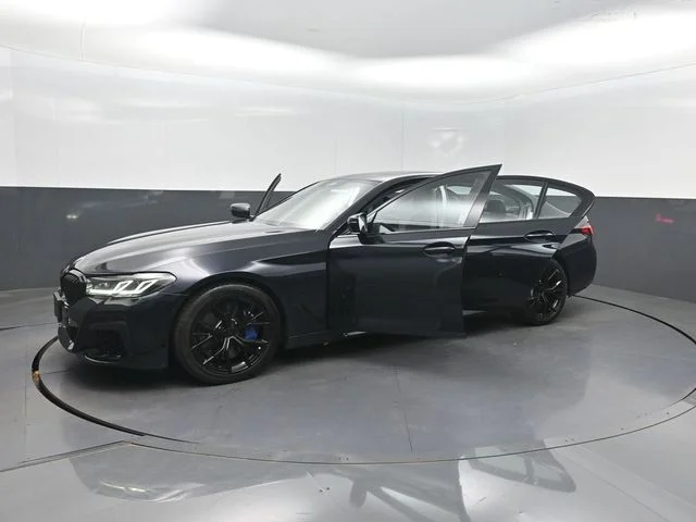 Used 2021 Black BMW M550i xDrive image 35