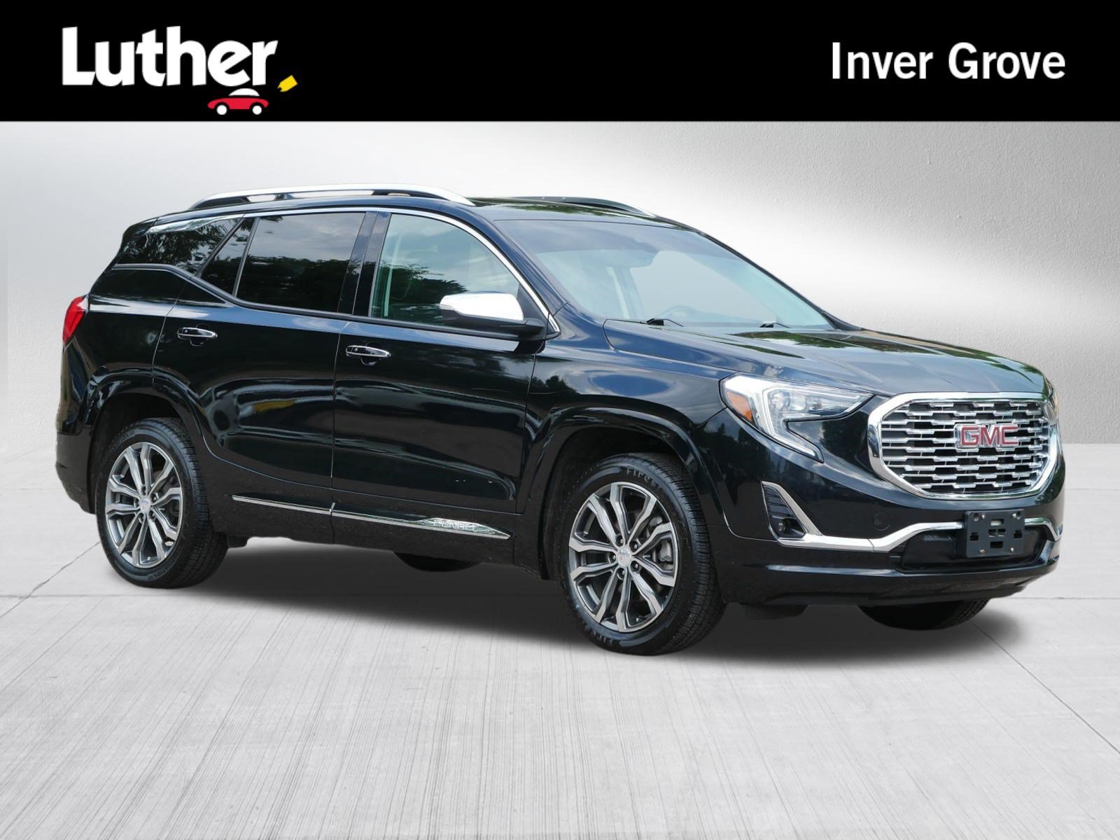 Used 2018 Ebony Twilight Metallic GMC Denali image 1