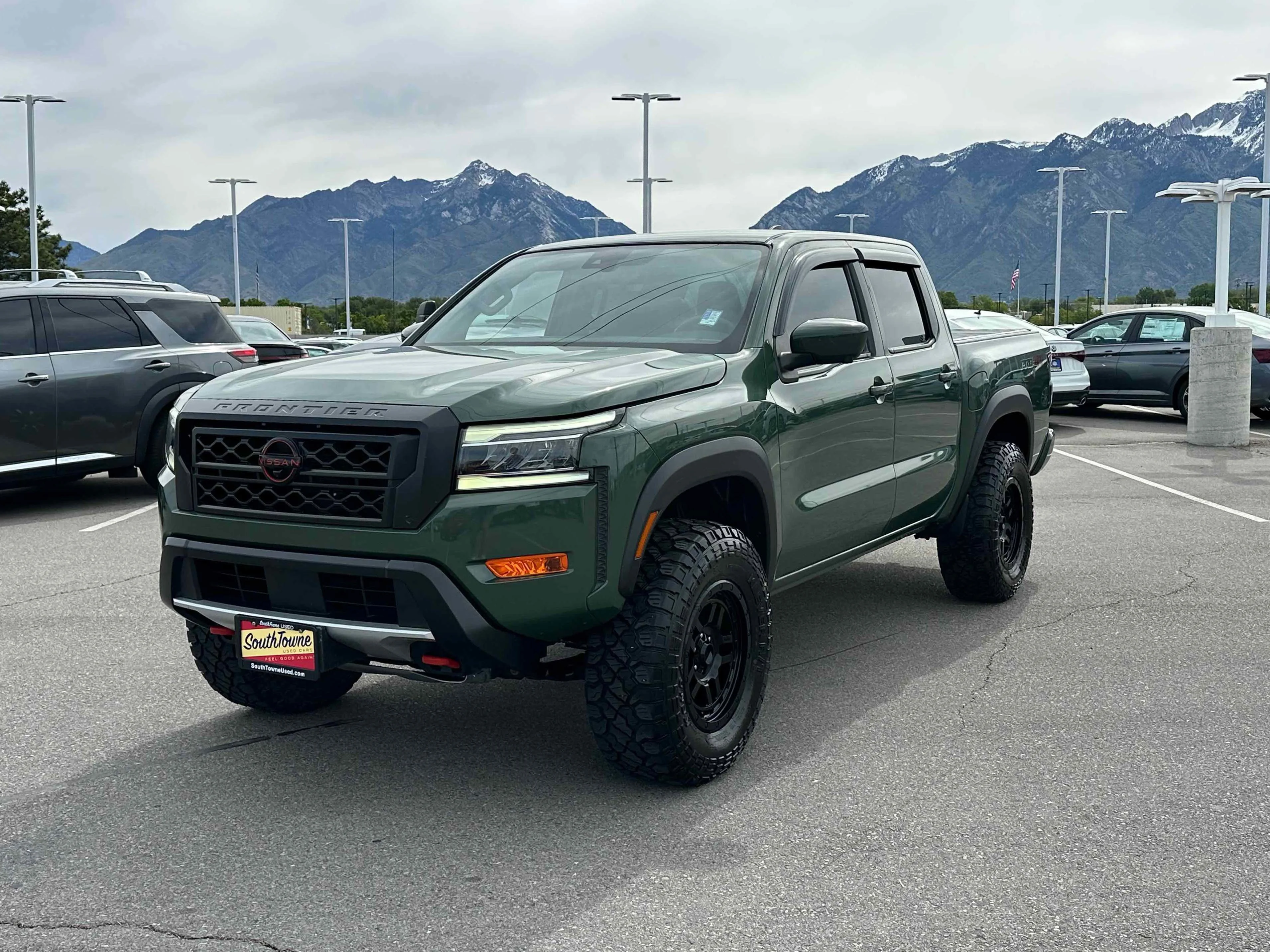 Used 2022 Tactical Green Metallic Nissan PRO-4X image 1