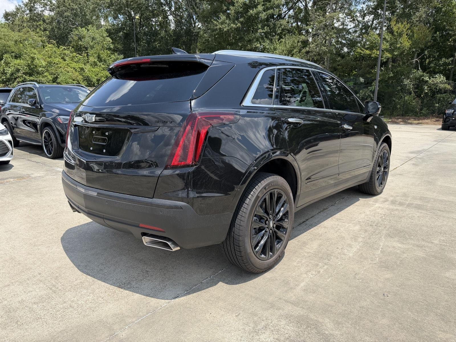 Used 2026 Stellar Black Metallic Cadillac FWD Luxury image 25