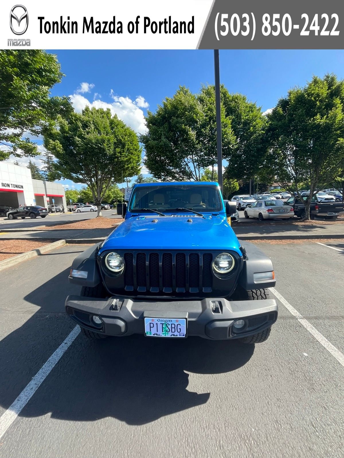Used 2022 Hydro Blue Pearl Coat Jeep Unlimited Willys image 1