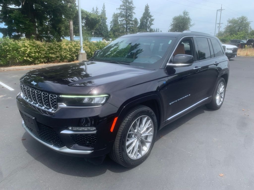 Used 2022 Brown Jeep Summit 4xe image 1