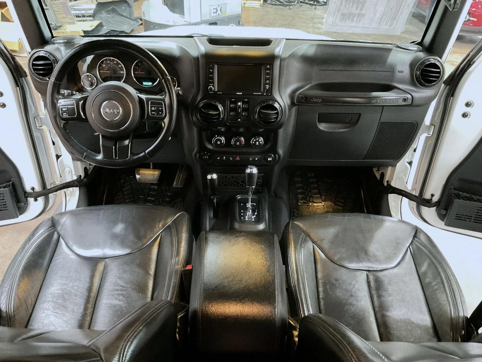 Used 2017 White Jeep Unlimited Sahara image 12