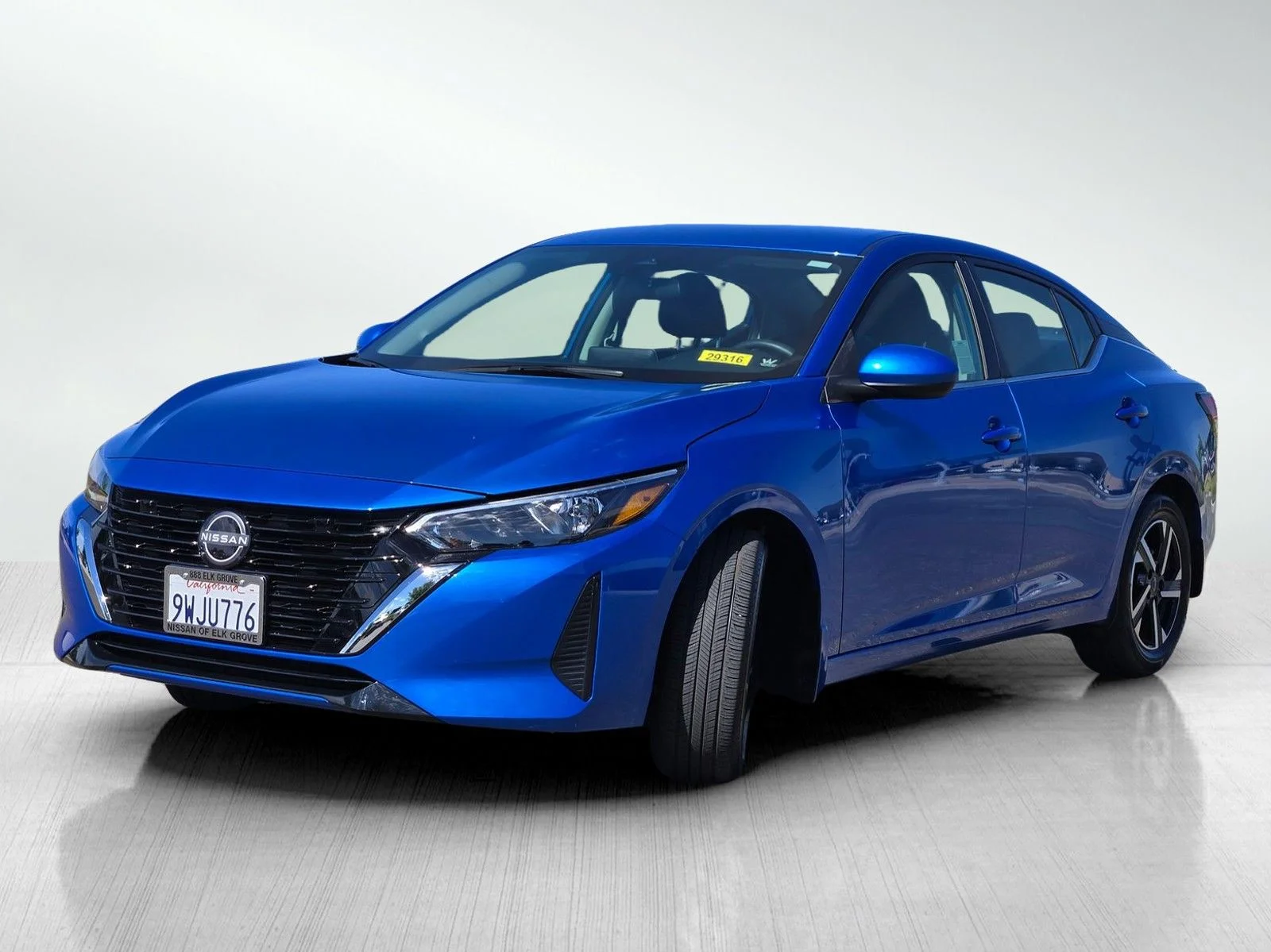 Used 2025 Electric Blue Metallic Nissan SV image 11
