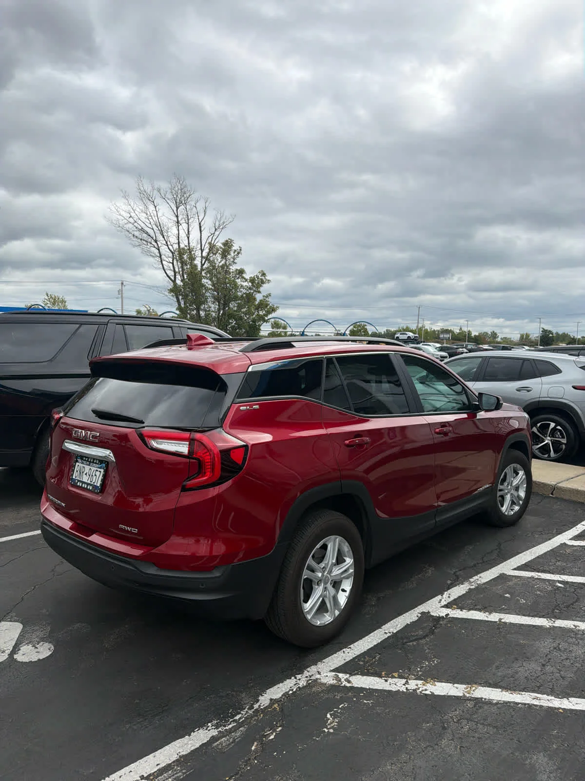 Used 2024 Volcanic Red Tintcoat GMC SLE image 3