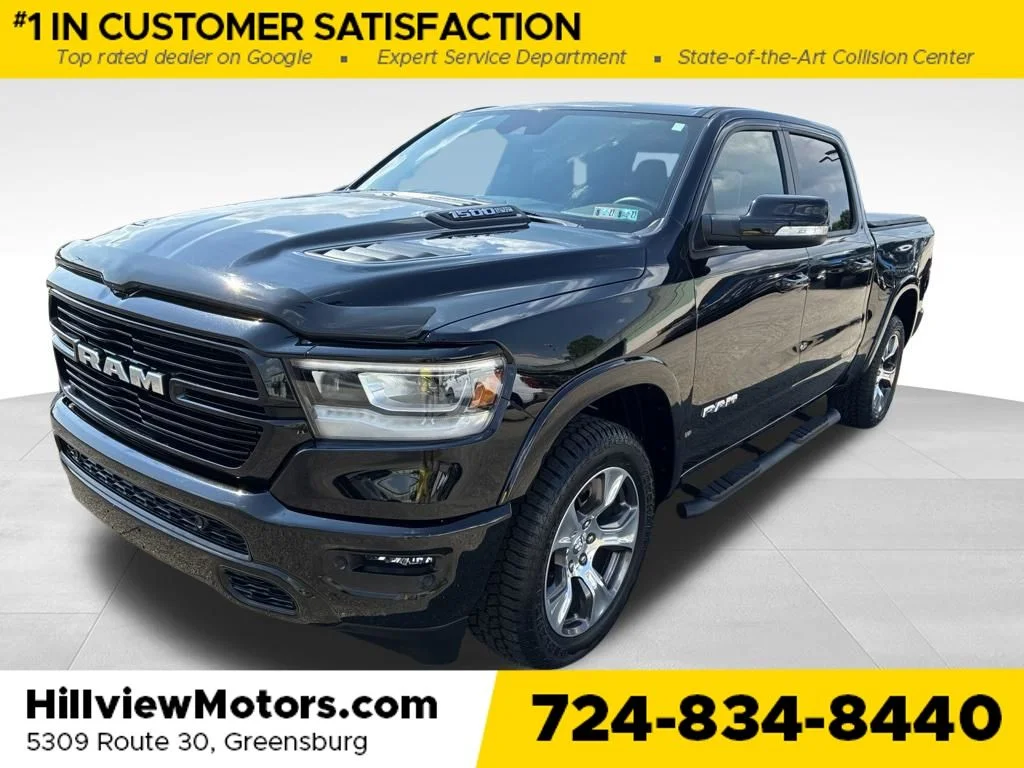 Used 2022 Diamond Black Ram Laramie image 1