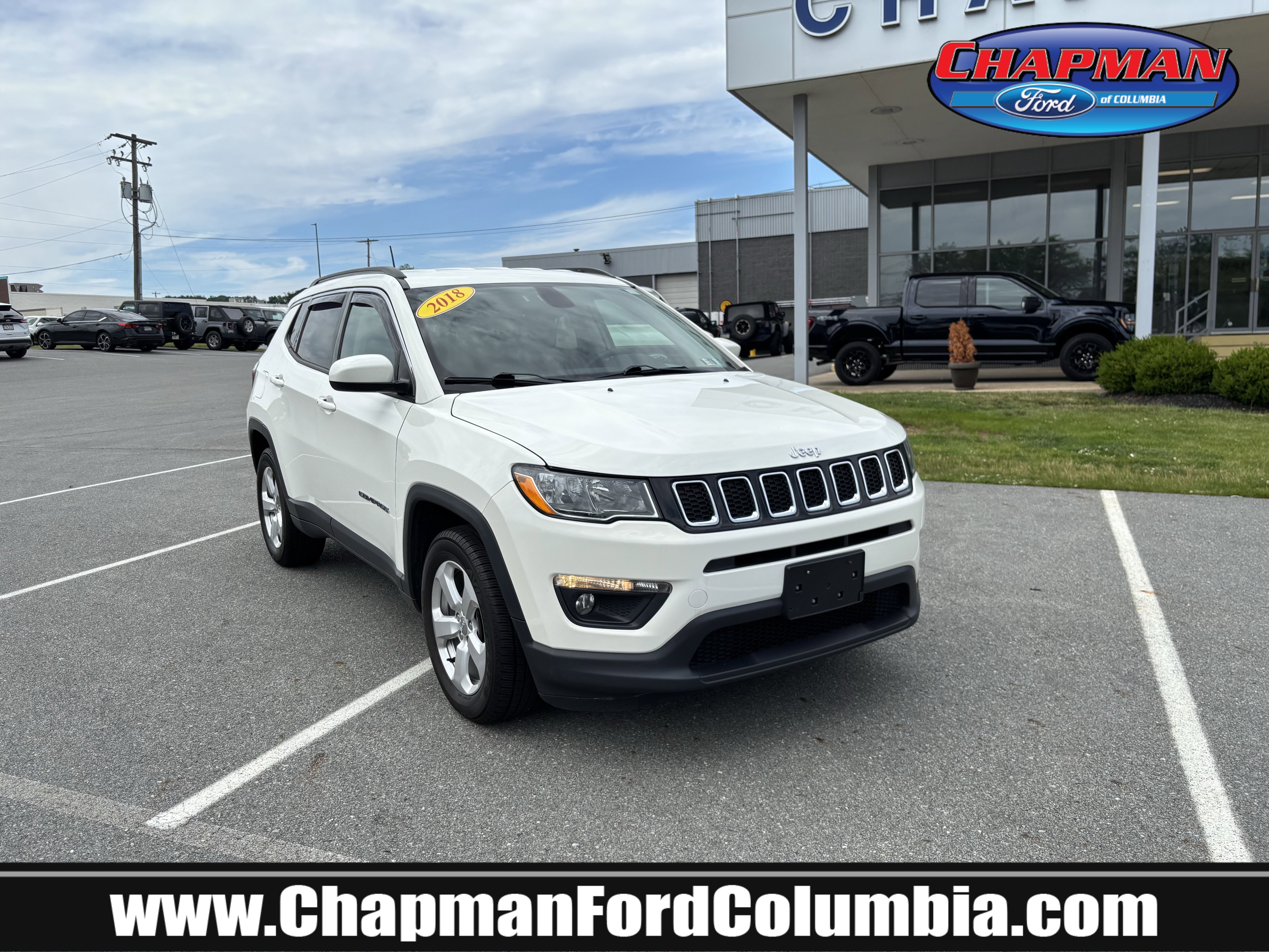 Used 2018 White Clearcoat Jeep Latitude image 1