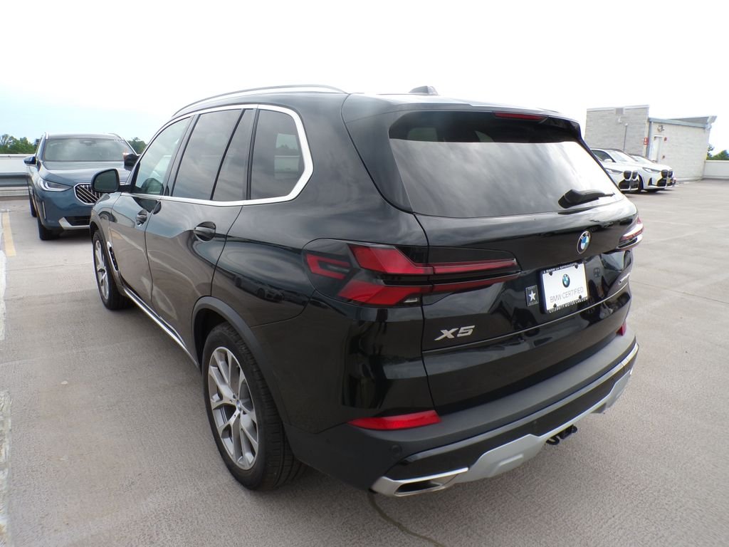 Certified Used 2024 Black Sapphire Metallic BMW xDrive40i image 4
