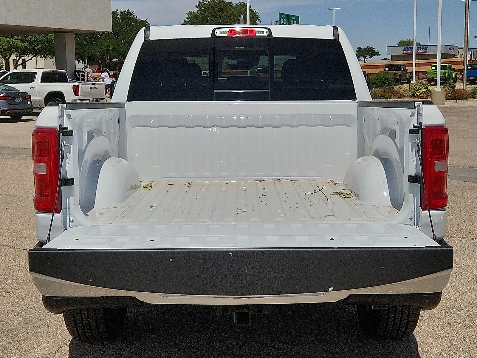 New 2026 Bright White Clearcoat Ram LONE STAR CREW CAB 4X4 5