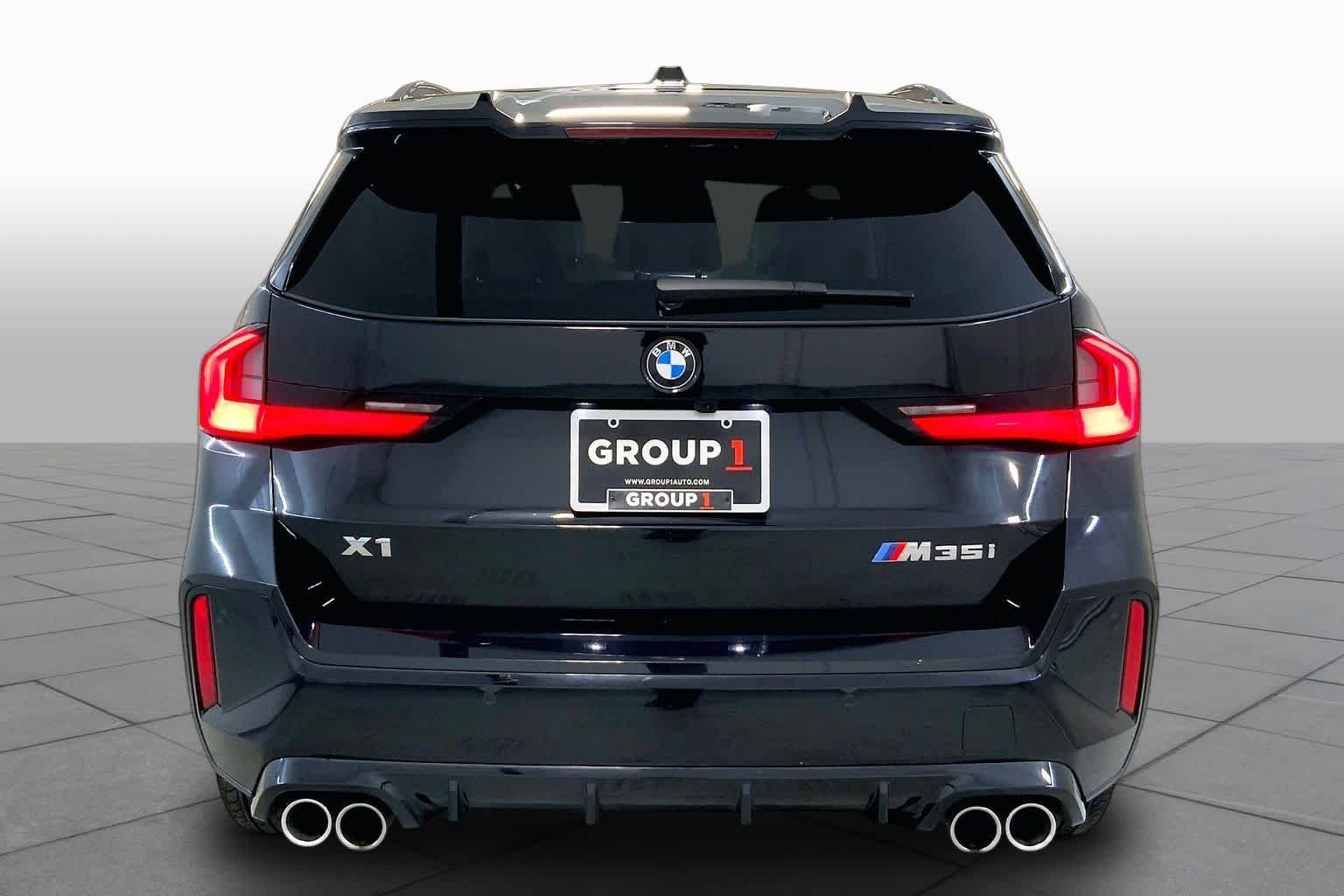 Certified Used 2026 Black Sapphire Metallic BMW M35i image 4