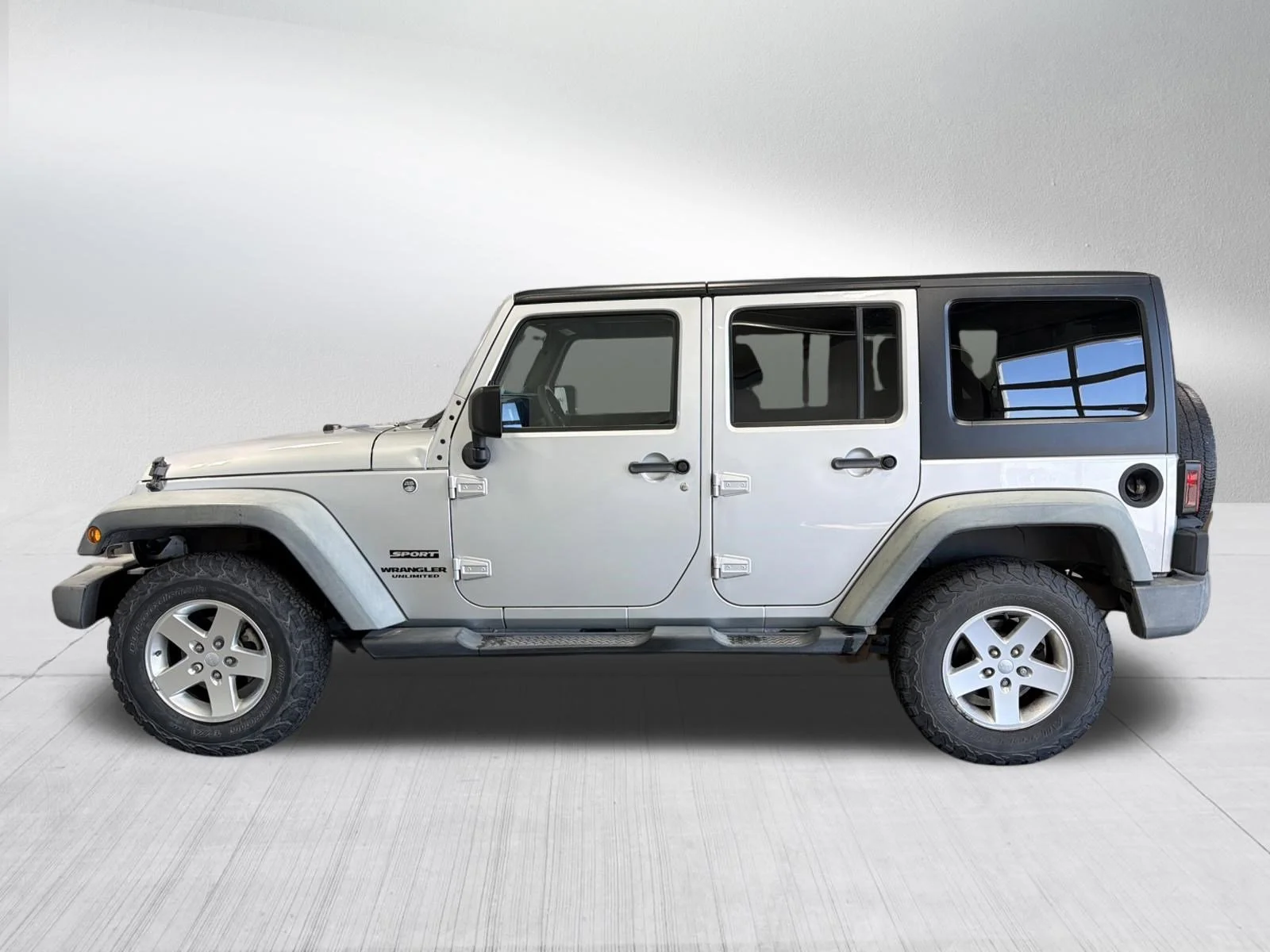 Used 2012 Bright Silver Metallic Jeep Sport image 4