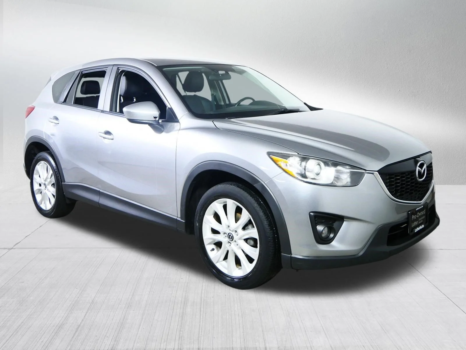 Used 2013 Liquid Silver Metallic Mazda Grand Touring image 1
