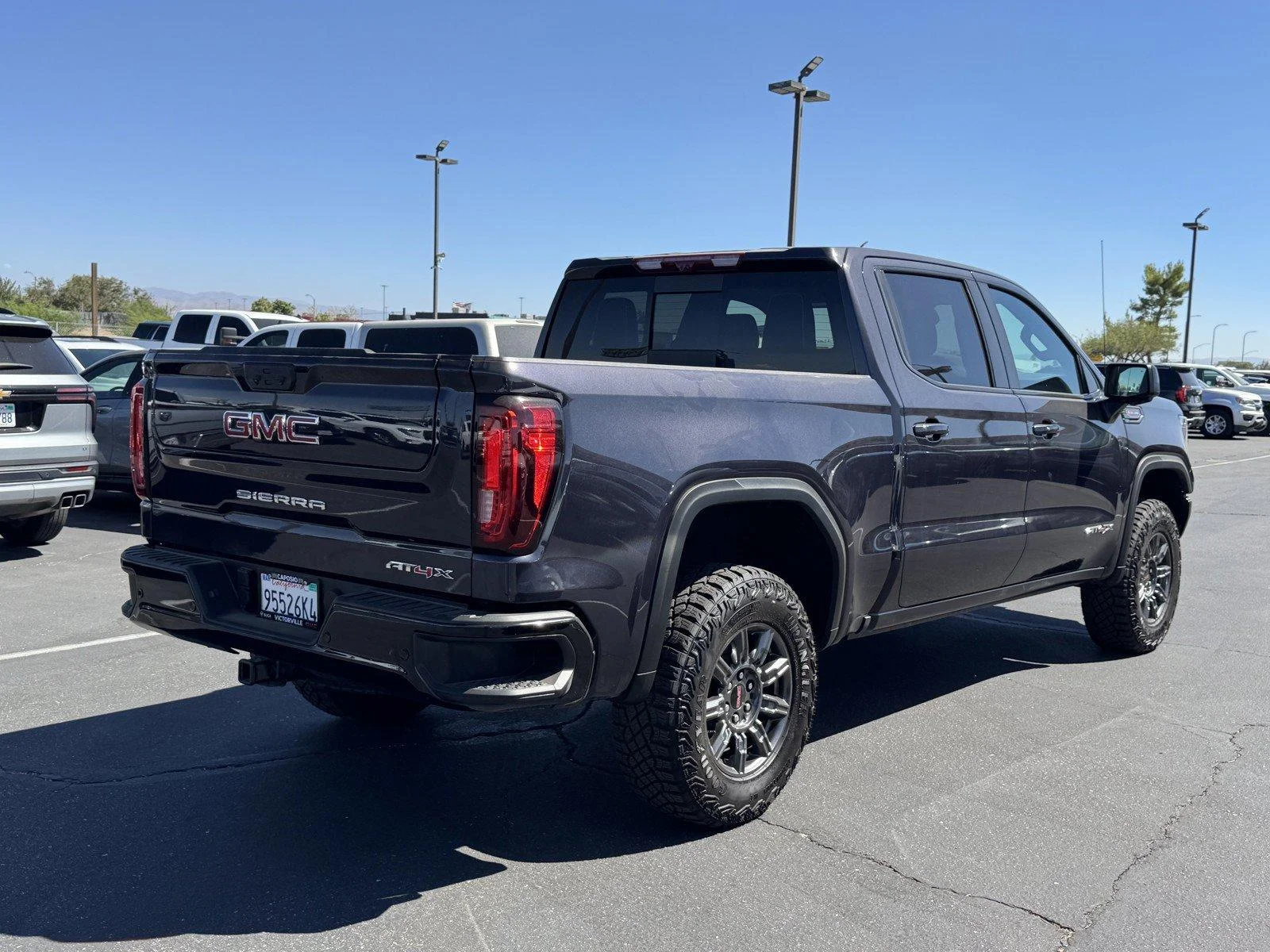New 2026 TITANIUM RUSH METALLIC GMC AT4X image 6