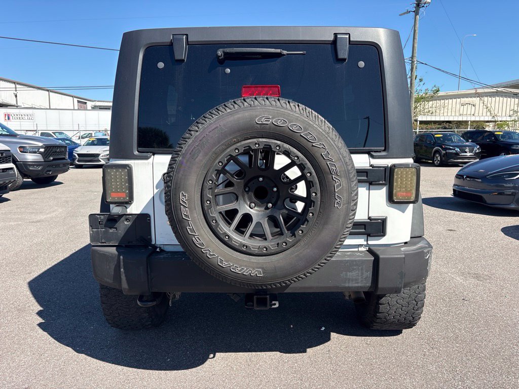 Used 2016 White Jeep Unlimited Sport image 4
