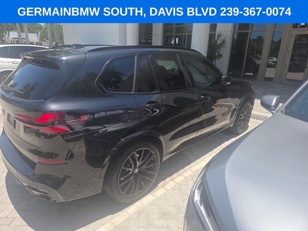 Certified Used 2026 Black Sapphire Metallic BMW sDrive40i image 19