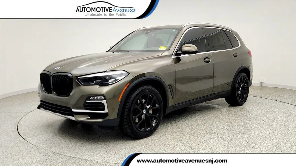 Used 2020 Manhattan Green Metallic BMW xDrive40i SAV w/ Vernasca Leather & Convenience Pkg image 1