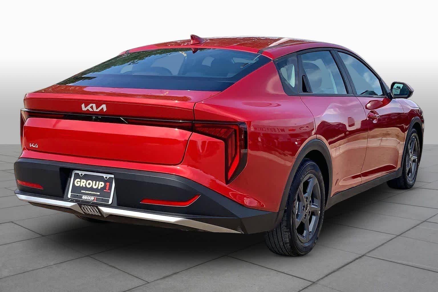 Used 2026 Currant Red Kia LXS image 13