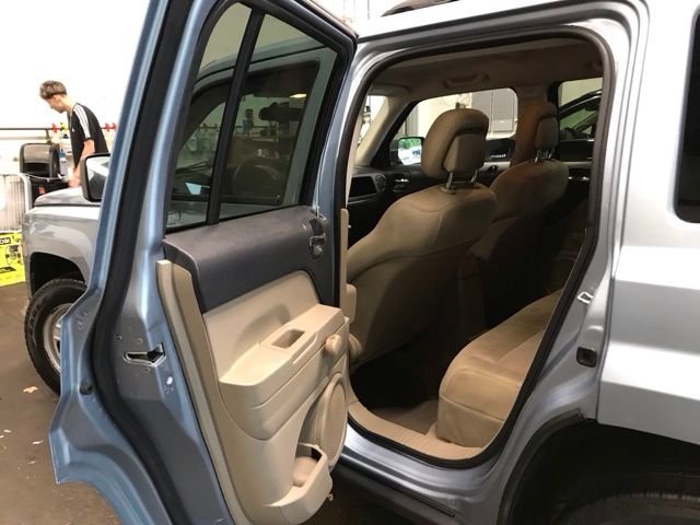 Used 2013 Beige Jeep Sport image 9