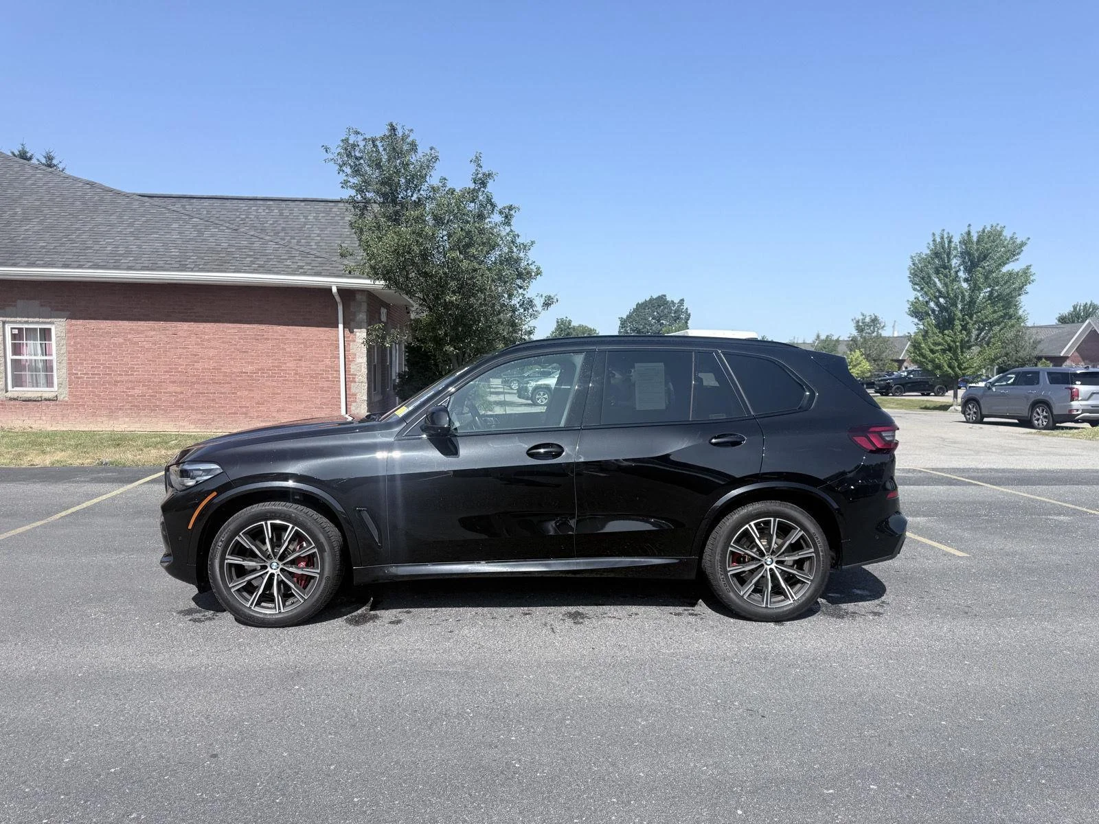 Used 2022 Black Sapphire Metallic BMW M50i image 4