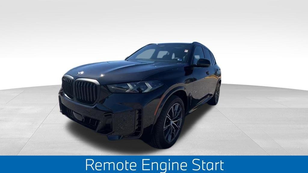 New 2026 Black Sapphire Metallic BMW xDrive40i image 7