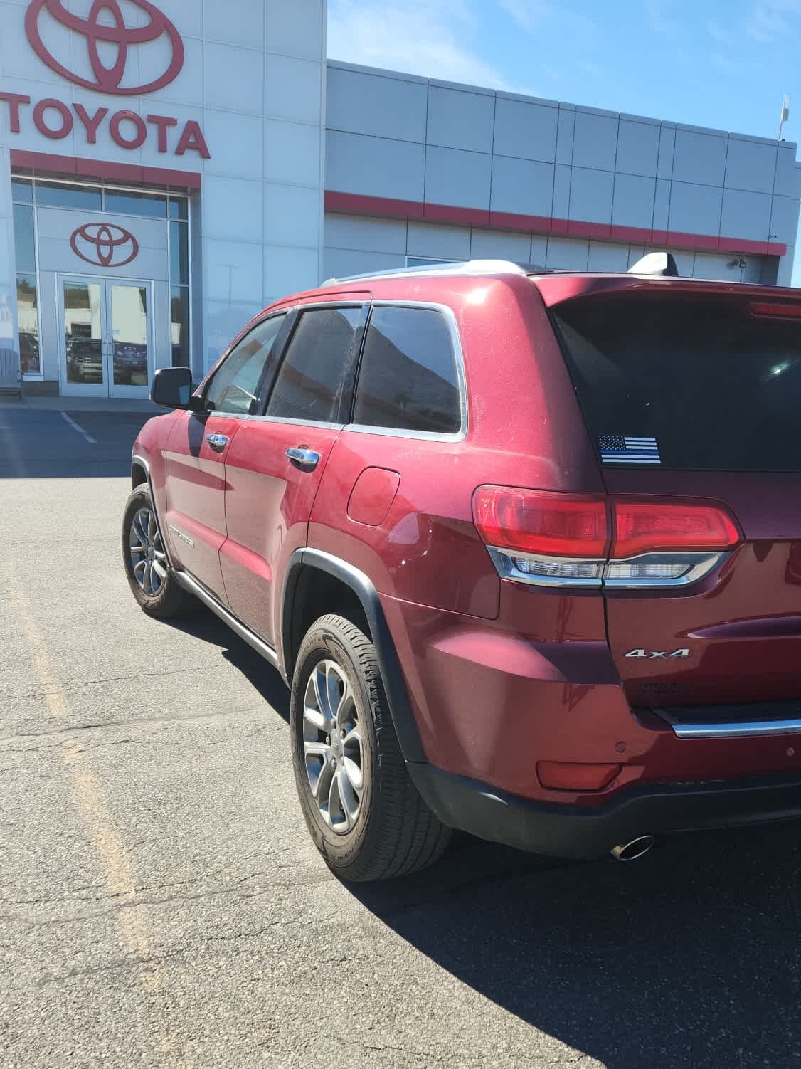 Used 2014 Deep Cherry Red Crystal Pearlcoat Jeep Limited image 4